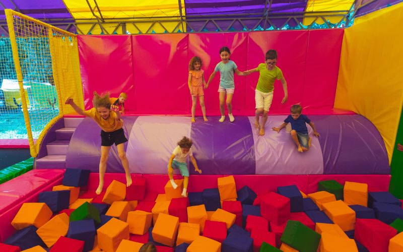 The Children Have a Great Time Together in the Trampoline Park The Children Have a Great Time Together in the Trampoline Park