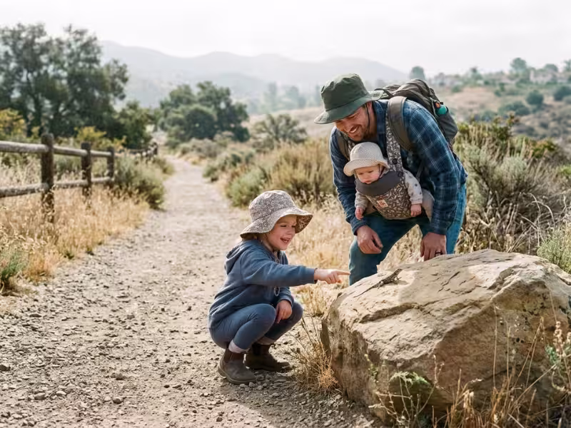 Family spotting a lizard on an easy trail Family spotting a lizard on an easy trail