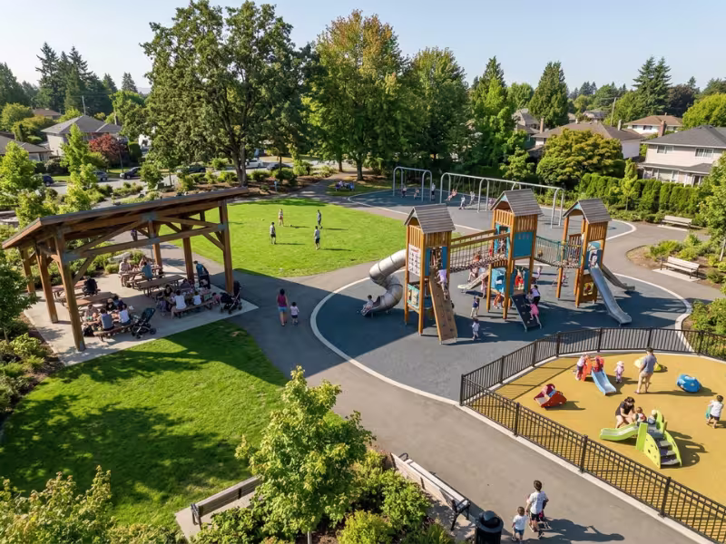 Playground layout with pavilion, lawn, and play zones Playground layout with pavilion, lawn, and play zones